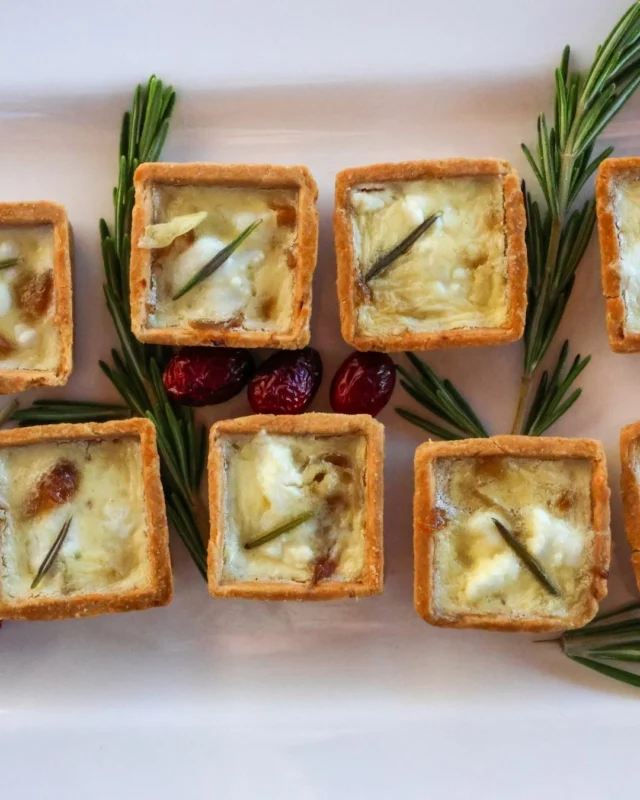 Perfectly sweet, savoury and bite-sized, these caramelized onion and goat cheese mini quiches are made for sharing.Find the full recipe on our website under Stories and try them this New Year's!